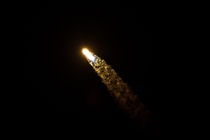  SpaceX Crew Dragon streaks across the predawn sky on its maiden Demo- flight
