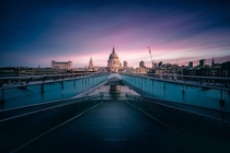  St Pauls Cathedral from Millennium Bridge just before sunrise 