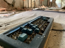 A broken keyboard from the s found in an unifentified abandoned building