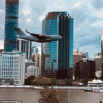 A C- flies through Brisbane Australia during an Air Show