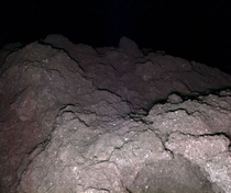 A color shot of the asteroid Ryugus surface  MASCOTDLRJAXA