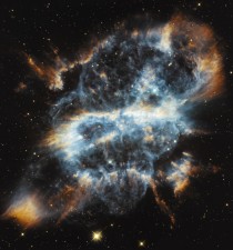 A Cosmic Holiday Ornament Hubble-Style The nearby planetary nebula NGC  