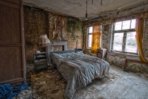 A Cozy Little Bedroom Being Overtaken by Nature in Belgium  by Elwin Borgman