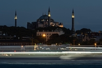 A ferry movs along the Golden Horn in the shadow of the Hagia Sophia Istanbul