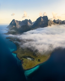 A few days ago I got this shot looking down at Lofoten Norway with low clouds rolling in 