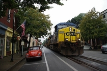 A freight train going down the street in La Grange USA