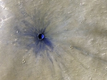 A fresh crater in Valles Marineris