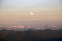 A full moon rising over the North Cascades 