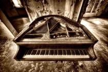 A grand piano silenced over time