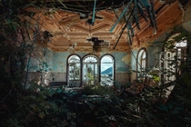A half ballroom of an abandoned hotel 
