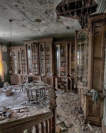A library inside an abandoned th century mansion
