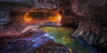 A panoramic view of Zions subway feature showcased in its sought after glowing light during autumn Zion National Park Utah Photo by Peter Coskun 