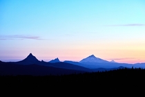 A pastel sunrise over the Oregon Cascades Three Sisters Wilderness 