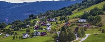 A peaceful hillside village situated in calm Norway 
