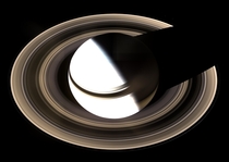 A picture of Saturn shot by the Cassini spacecraft using a technique called a pi transfer This technique uses the gravity of Saturns largest moon Titan to alter the orbit of Cassini so that it can gain different perspectives on Saturn 