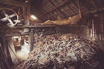 A pile of wood in an old barn in Sweden Album in comments  Photo by Malin Lavn