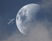 A plane photobombed one of my moon shots