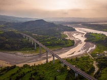 A railway line leading towards Jammu city over river Tawi in India