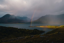A rainbow cutting through the incredible landscape of Torridon - Scotland 