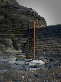 A rusting ladder on a beach defence in Aberystwyth Wales 