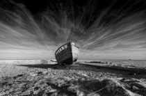 A shipwreck well away from water near Dungeness UK  by garthursnapshot