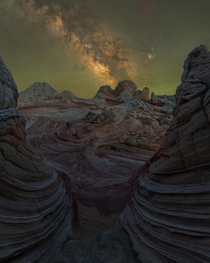 A shot of the Milky Way rising over some formations in the Utah-Arizona 