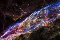 A small section in the outer shell of the Veil Nebula known as NGC  or more colloquially the Witchs Broom Nebula NASAESAHubble 