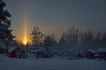 A Sun Pillar Over Sweden  When the air is cold and the Sun is rising or setting falling ice crystals can reflect sunlight and create an unusual column of light 