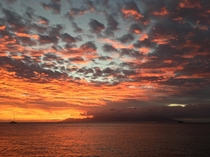 A vivid sunset on Tahiti a few years back while facing the island Moorea in the distance  x