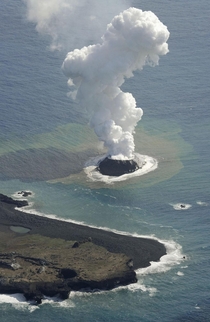 A Volcanic eruption in the Pacific Ocean creates new island near Japan
