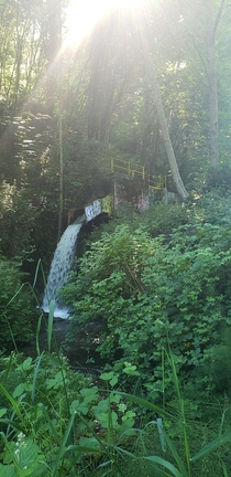 A waterfall at an abandoned paper mill