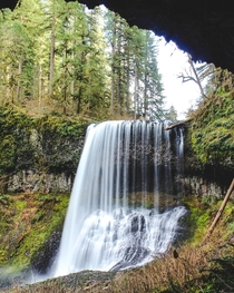 A waterfall viewed from a cave Silver Falls State Park  itkjpeg