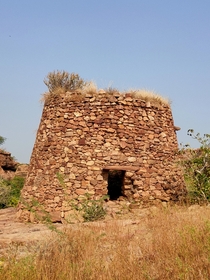 Abandoned armorywatch tower dating back to th or th century AD in Badami India 