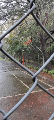 Abandoned basketball courts on the grounds of former mental hospital