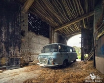 Abandoned blue Barkas B campervan in a barn Belgium 