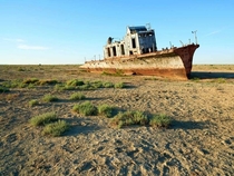 Abandoned boat in a dry bed