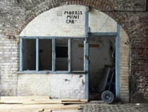Abandoned cab office railway arch London