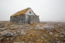 Abandoned cabin on top of a hill in Iceland 