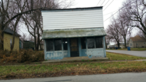 Abandoned corner store in residential neighborhood Springfield Mo 