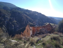 Abandoned cottage on the very edge of a deep canyon in Southern Spain 