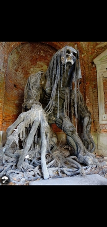 Abandoned demon statue in Poland