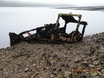 Abandoned dozer on the shore of Observatory Inlet