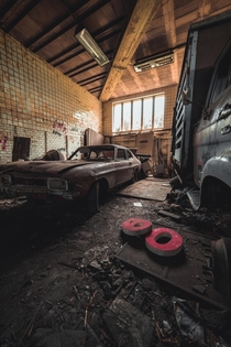 Abandoned Ford in an old shed in Belgium Part of a larger collection of cars left to decay  diaryoftwan