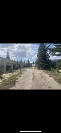 Abandoned garages with cars still inside