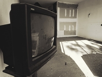 Abandoned Hotel Room with Retro Tv