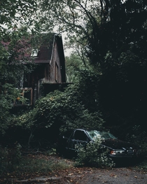Abandoned house and BMW