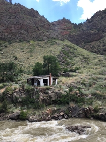 Abandoned house on the Arkansas river View from the Royal Gorge train in Caon Colorado