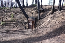 Abandoned logging dynamite bunker from s uncovered by forest fire in Big Basin park CA httpsslvpostcomabandoned-bunker-in-the-czu-burn-zone