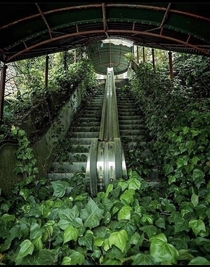 Abandoned mall escalators in An abandoned theme Park in Nagasaki Japan called Holland Village