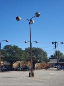 Abandoned mid-century parking lot lamps in Montgomery Alabama